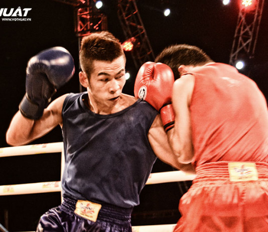 Trận chung kết gay cấn giữa hai võ sỹ Nguyễn Văn Dễ (Quân Đội) và Ngô Việt Nhật (Quảng Ngãi)